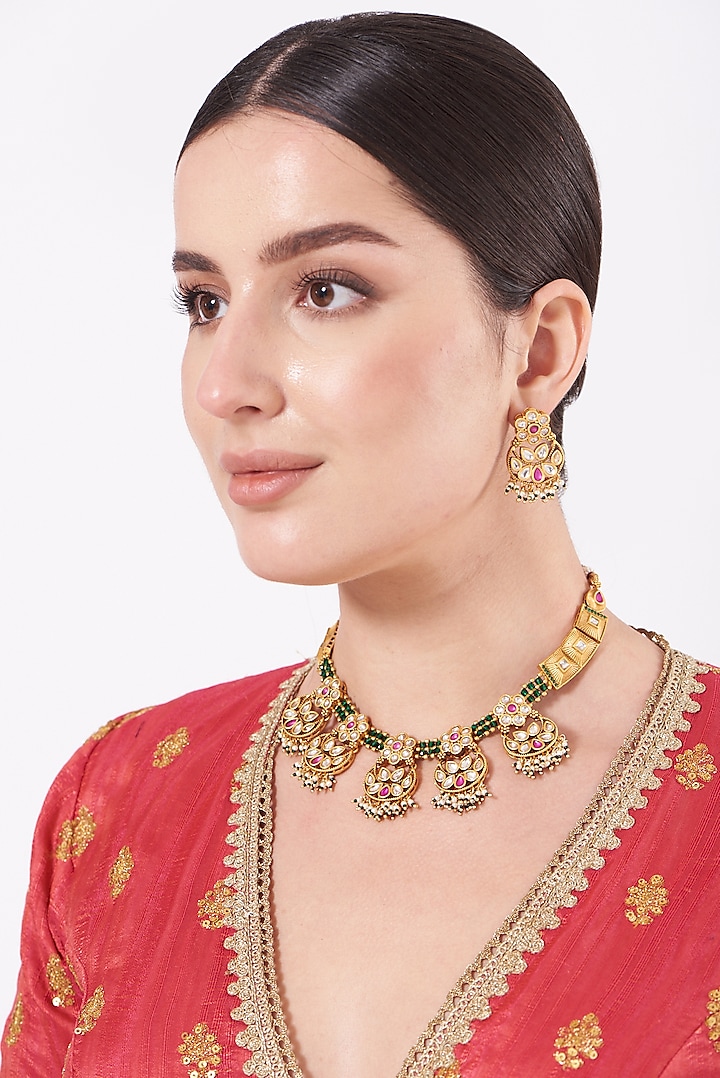 Gold Finish Temple Motifs & Green Stone Choker Necklace Set by VASTRAA Jewellery