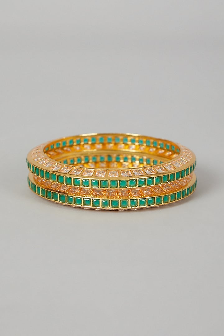 Gold Finish Zircon & Green Stone Bangles (Set of 2) by VASTRAA Jewellery at Pernia's Pop Up Shop