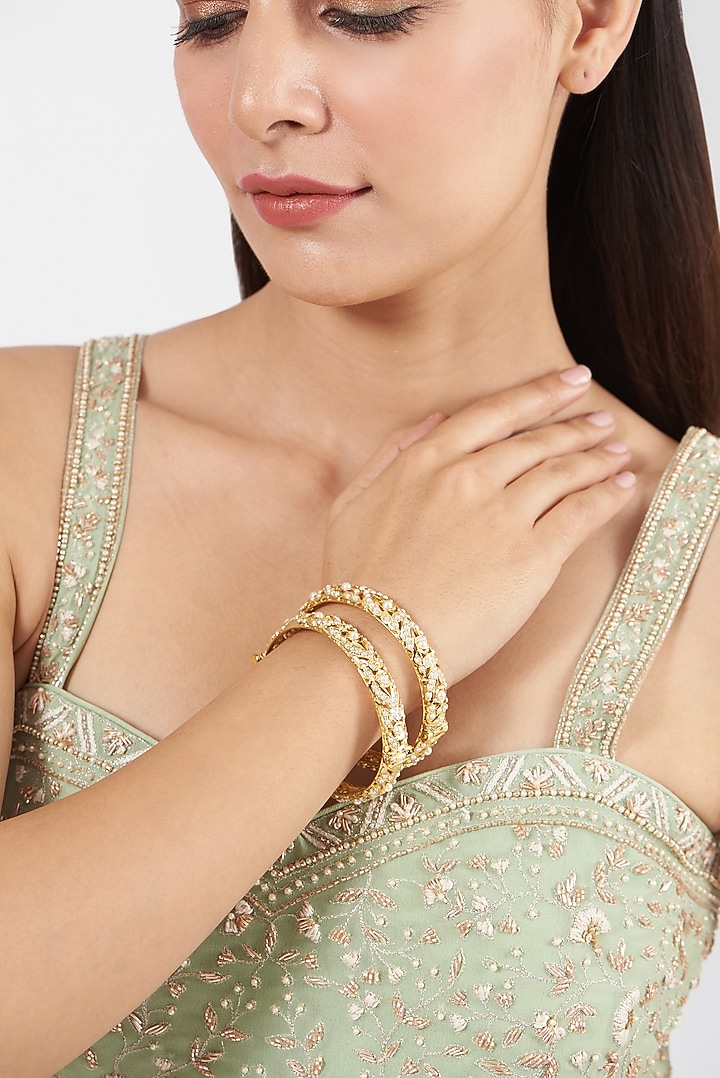 Gold Finish Kundan Polki Bangles (Set of 2) by VASTRAA Jewellery at Pernia's Pop Up Shop