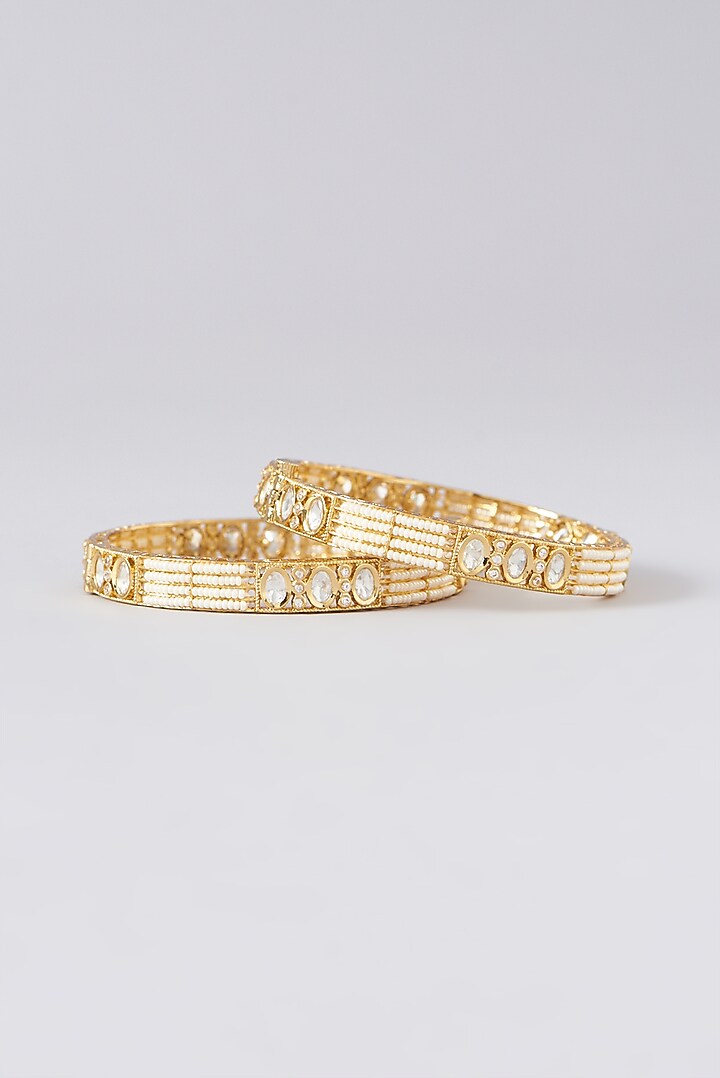 Gold Finish Kundan Polki & Pearl Bangles (Set of 2) by VASTRAA Jewellery at Pernia's Pop Up Shop