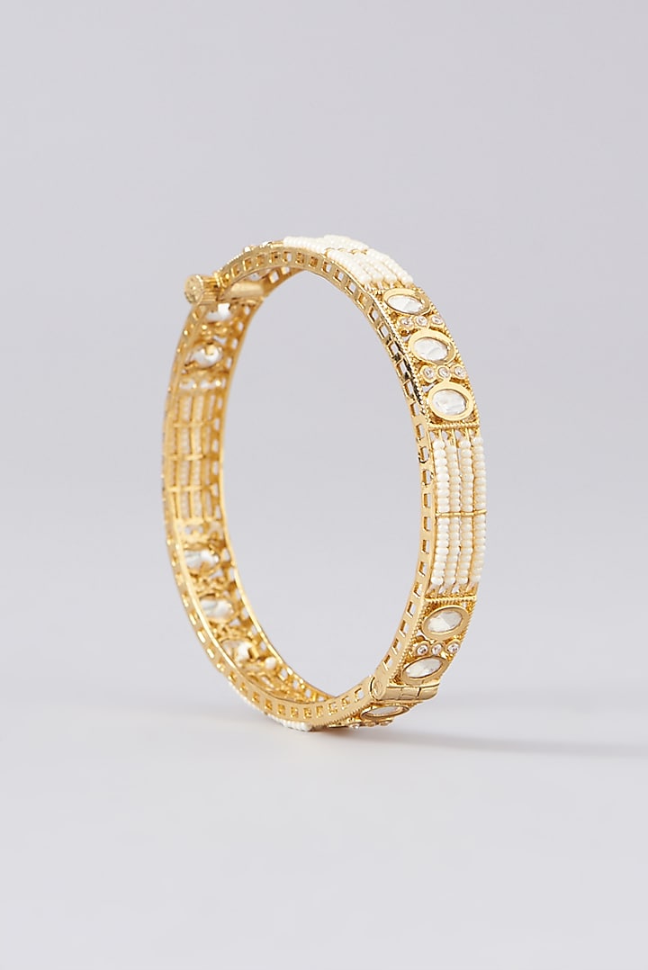 Gold Finish Kundan Polki & Pearl Bangles (Set of 2) by VASTRAA Jewellery at Pernia's Pop Up Shop