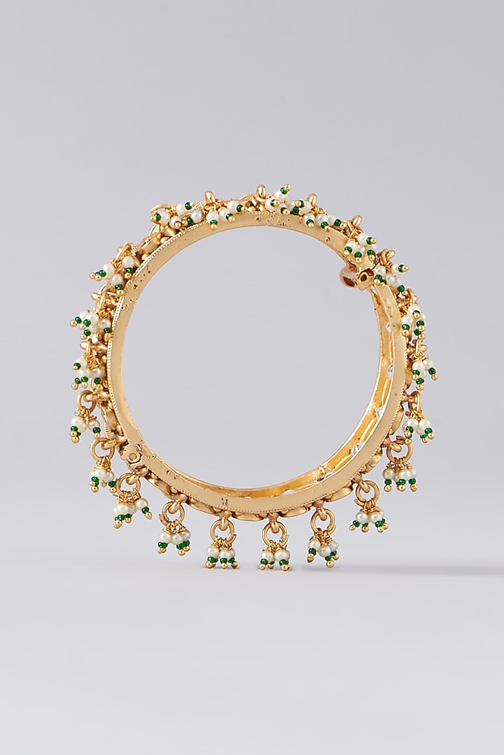 Gold Finish Kundan Polki & Pink Stone Bangles (Set of 2) by VASTRAA Jewellery at Pernia's Pop Up Shop