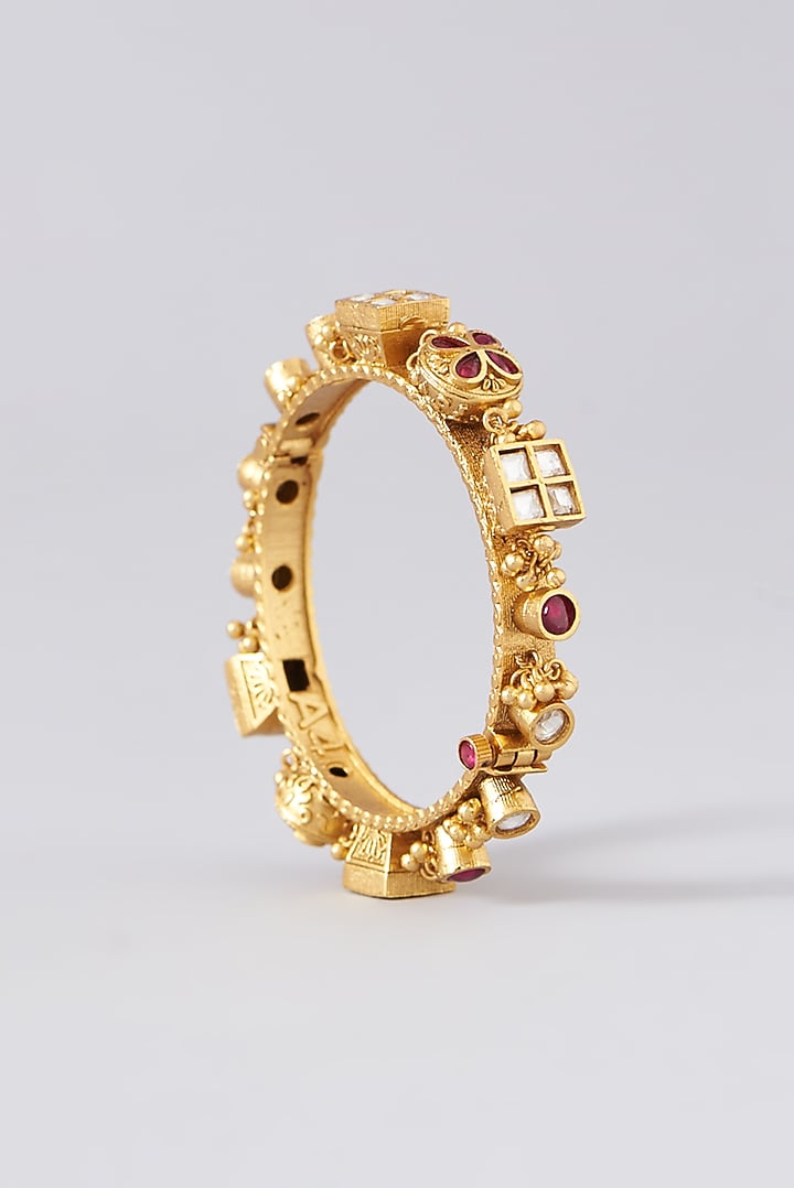 Gold Finish Kundan Polki & Red Stone Bangles (Set of 2) by VASTRAA Jewellery at Pernia's Pop Up Shop