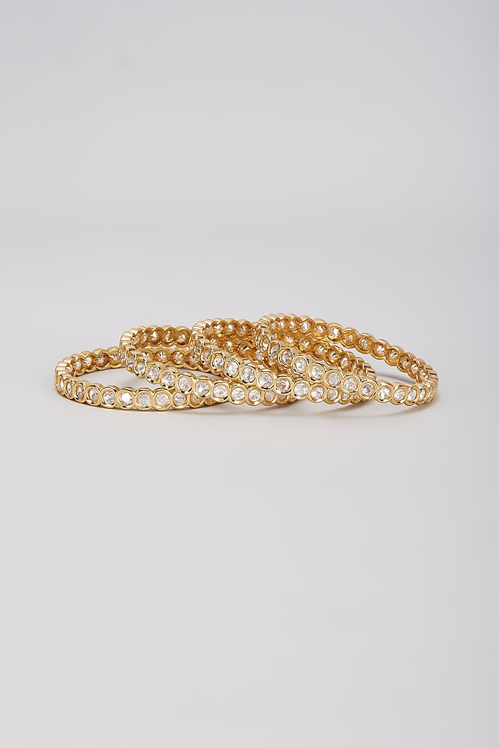 Gold Finish Kundan Polki Bangles (Set of 4) by VASTRAA Jewellery at Pernia's Pop Up Shop