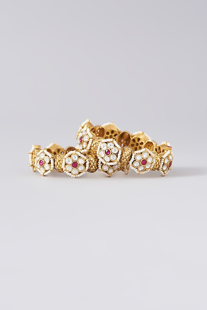 Gold Finish Kundan Polki & Red Synthetic Stone Bangles (Set Of 2) by VASTRAA Jewellery at Pernia's Pop Up Shop