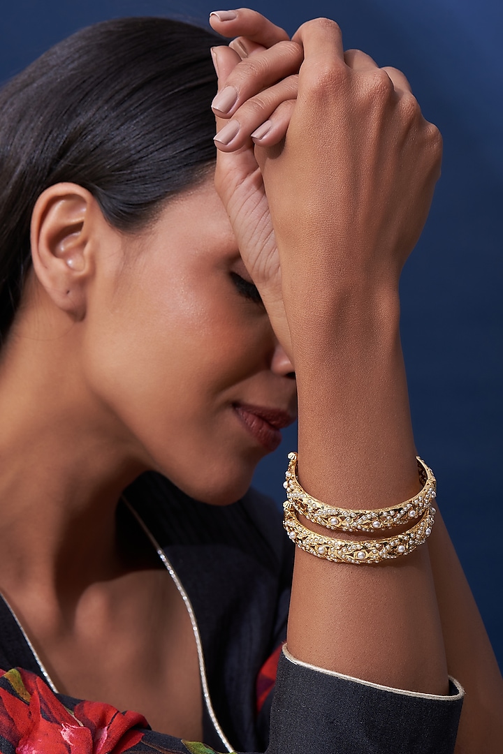 Gold Finish Pearl Bangles (Set of 2) by VASTRAA Jewellery at Pernia's Pop Up Shop