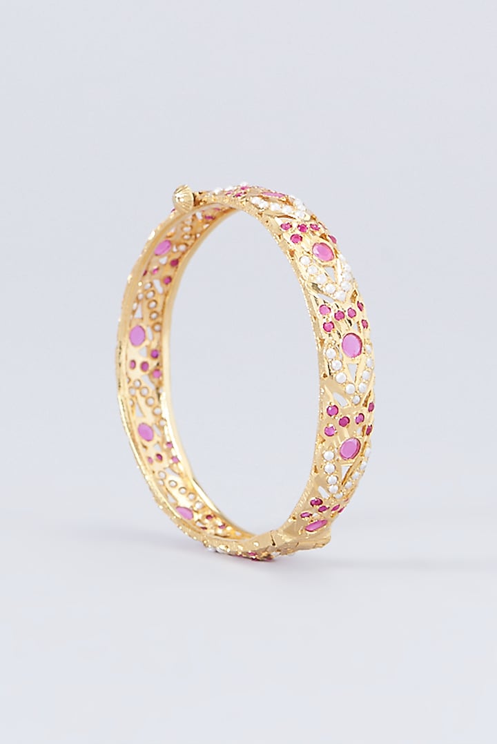 Gold Finish Kundan Polki & Red Stone Bangles (Set of 2) by VASTRAA Jewellery at Pernia's Pop Up Shop
