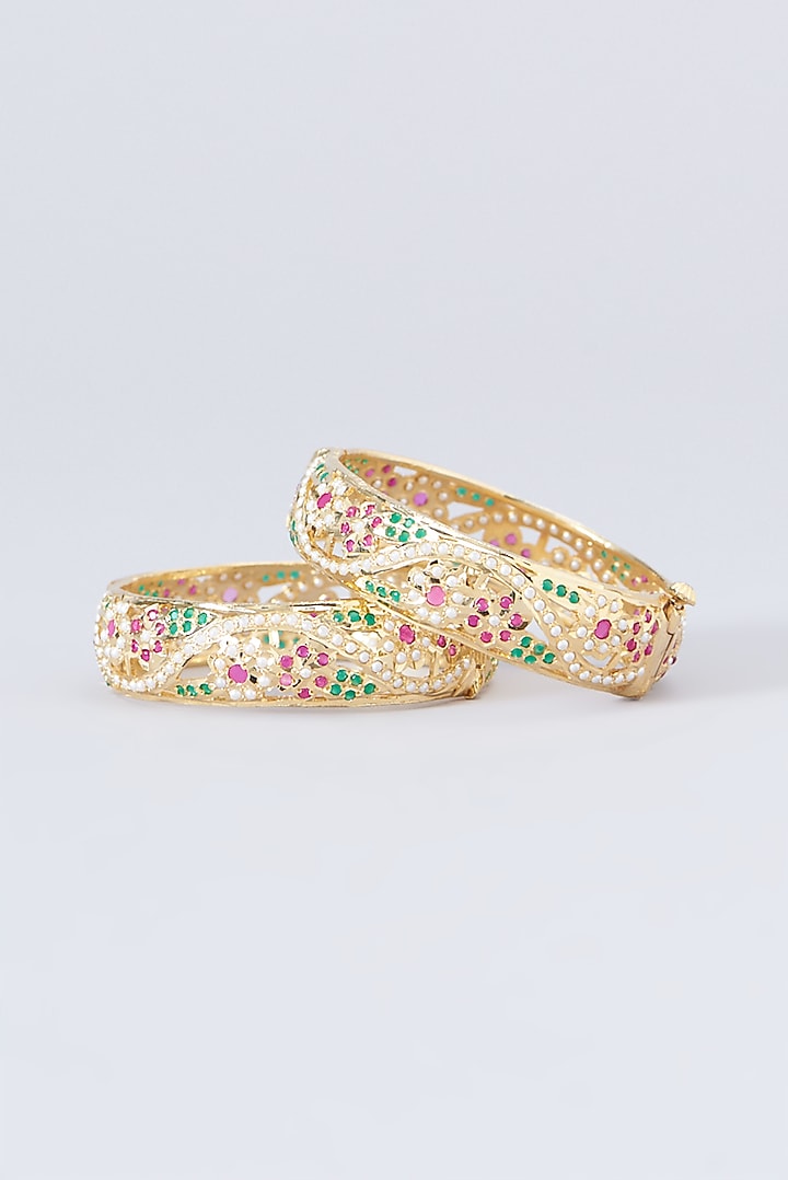 Gold Finish Kundan Polki & Multi-Colored Stone Bangles (Set of 2) by VASTRAA Jewellery at Pernia's Pop Up Shop