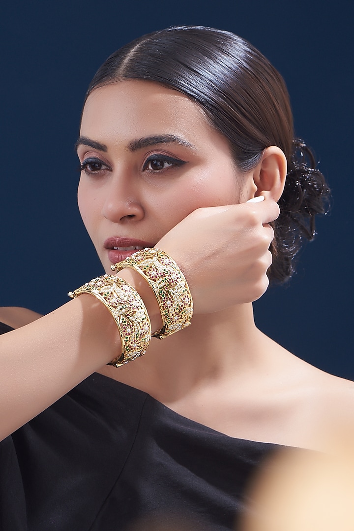 Gold Finish Kundan Polki & Multi-Colored Stone Bangles (Set of 2) by VASTRAA Jewellery at Pernia's Pop Up Shop