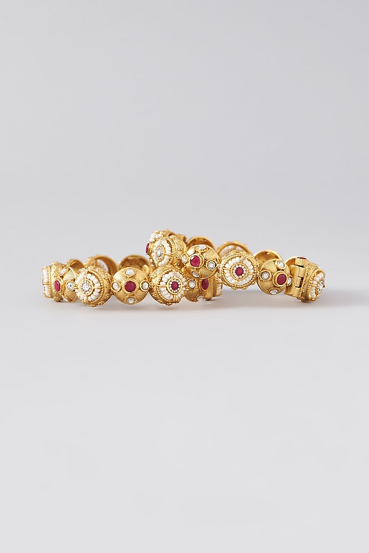 Gold Finish Kundan Polki & Red Stone Bangles (Set Of 2) by VASTRAA Jewellery