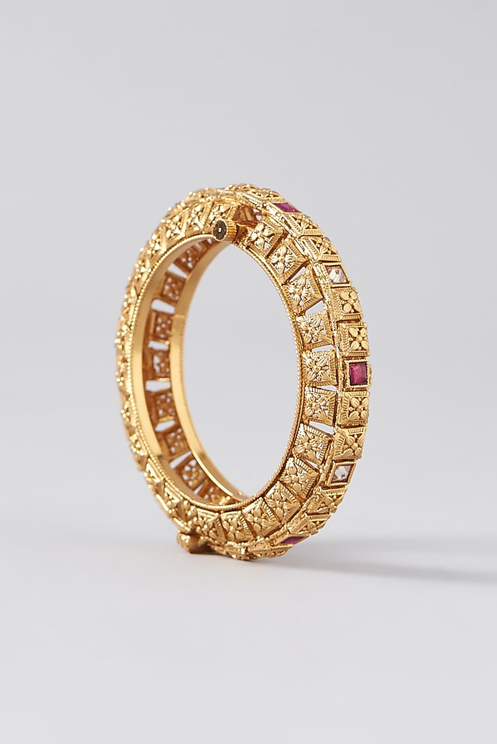 Gold Finish Kundan Polki & Red Stone Bangles (Set Of 2) by VASTRAA Jewellery at Pernia's Pop Up Shop