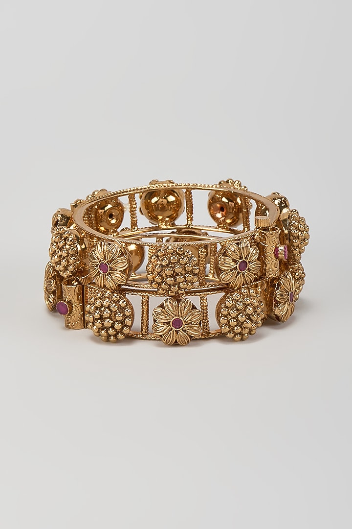 Gold Finish Red Stone Temple Motif Bangles (Set Of 2) by VASTRAA Jewellery at Pernia's Pop Up Shop
