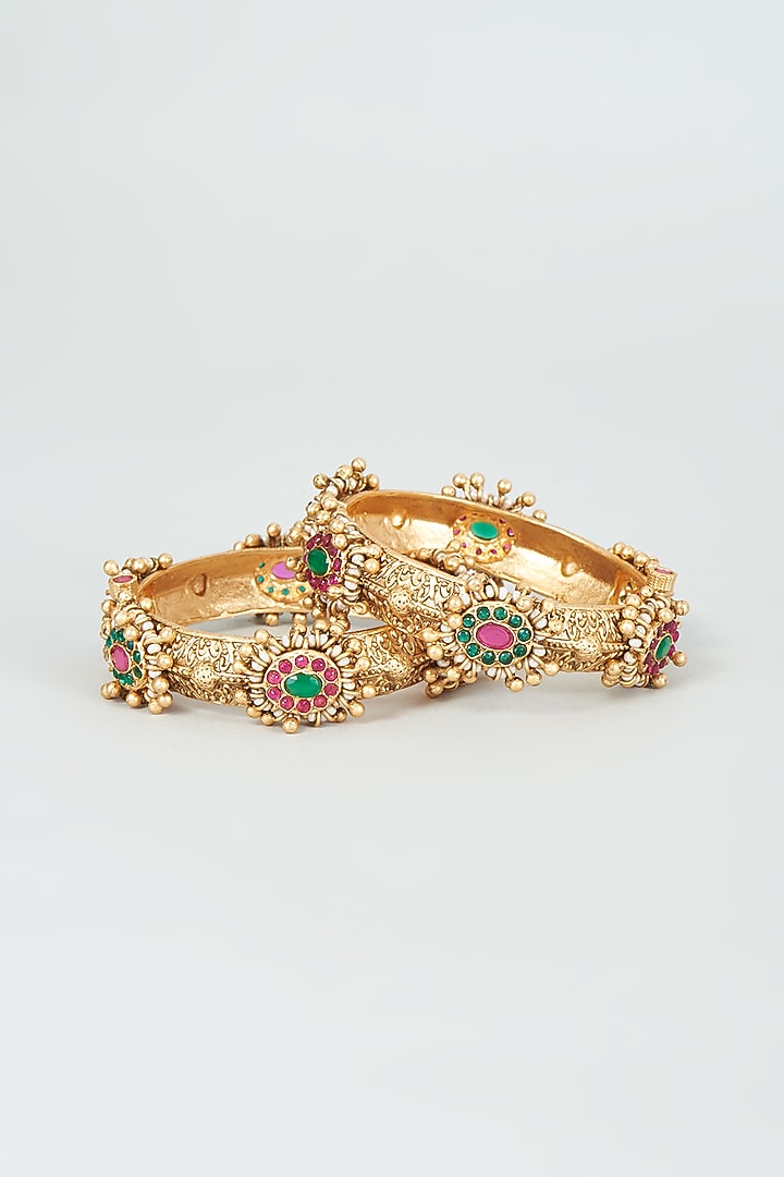 Gold Finish Kundan Polki & Multi-Colored Stone Temple Bangles (Set Of 2) by VASTRAA Jewellery at Pernia's Pop Up Shop