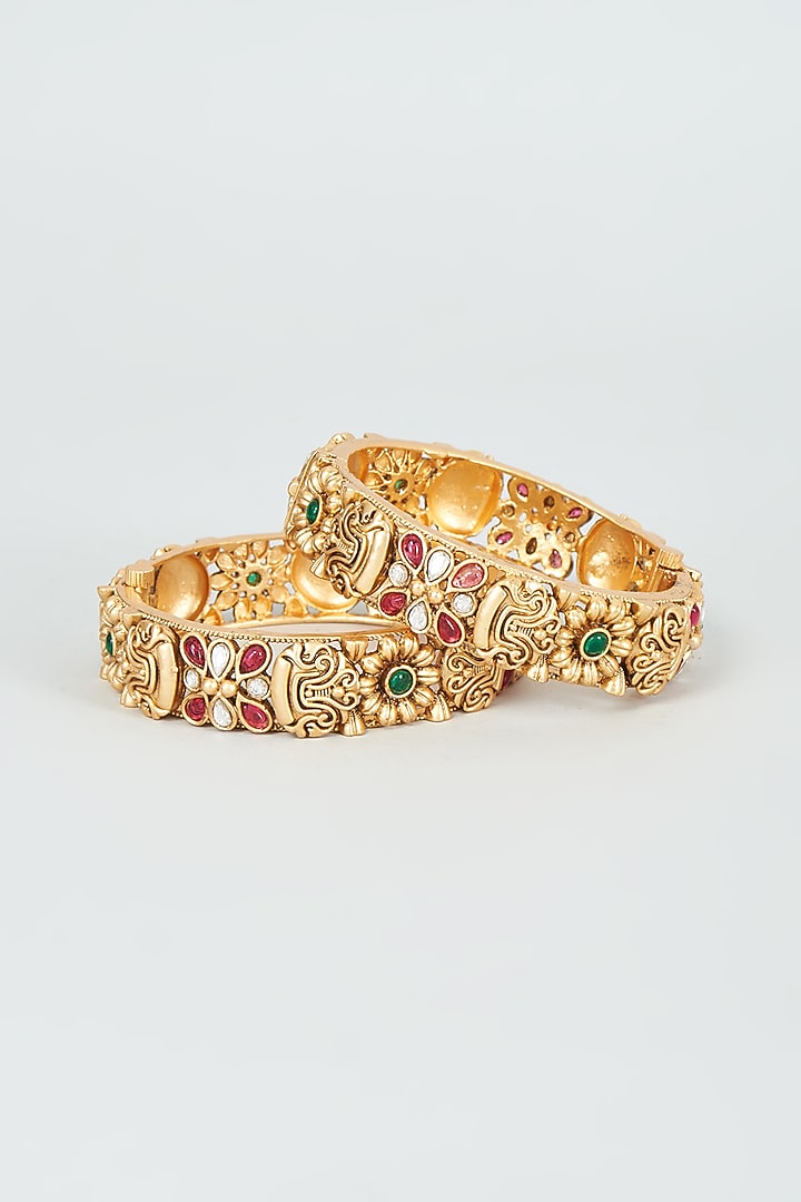 Gold Finish Kundan Polki & Multi-Colored Stone Temple Bangles (Set Of 2) by VASTRAA Jewellery at Pernia's Pop Up Shop