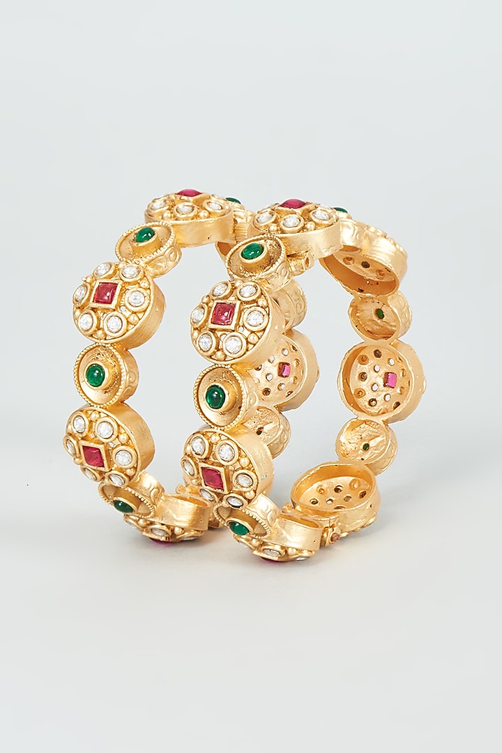 Gold Finish Kundan Polki & Multi-Colored Stone Temple Bangles (Set Of 2) by VASTRAA Jewellery at Pernia's Pop Up Shop