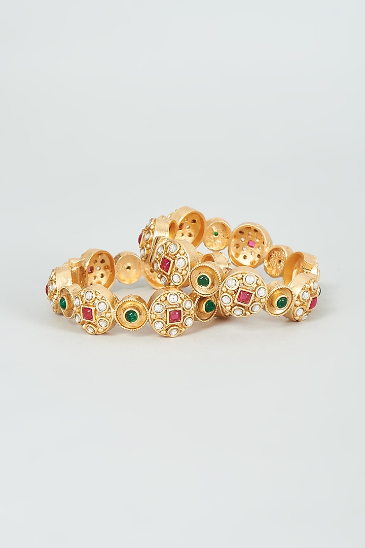 Gold Finish Kundan Polki & Multi-Colored Stone Temple Bangles (Set Of 2) by VASTRAA Jewellery at Pernia's Pop Up Shop