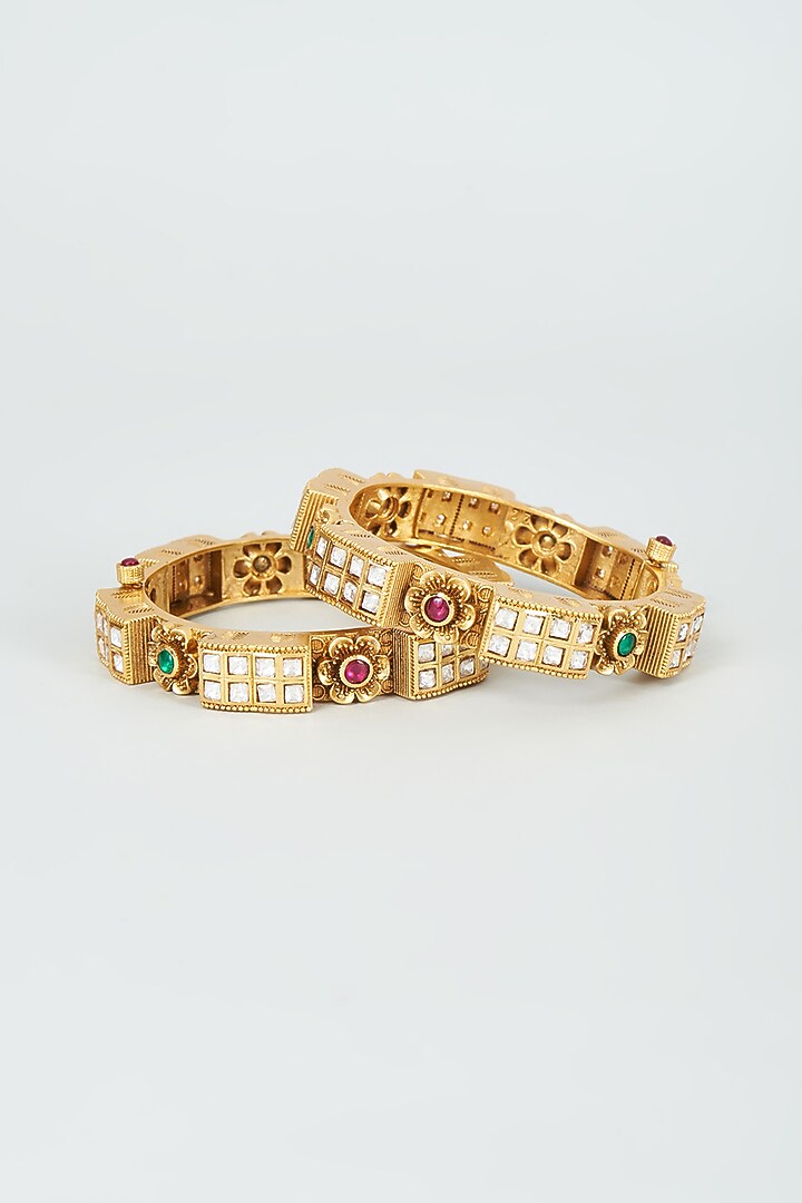 Gold Finish Kundan Polki & Multi-Colored Stone Temple Bangles (Set Of 2) by VASTRAA Jewellery at Pernia's Pop Up Shop