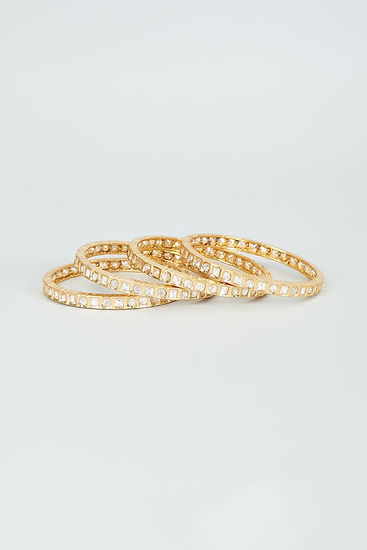 Gold Finish Kundan Polki Bangles (Set of 4) by VASTRAA Jewellery at Pernia's Pop Up Shop