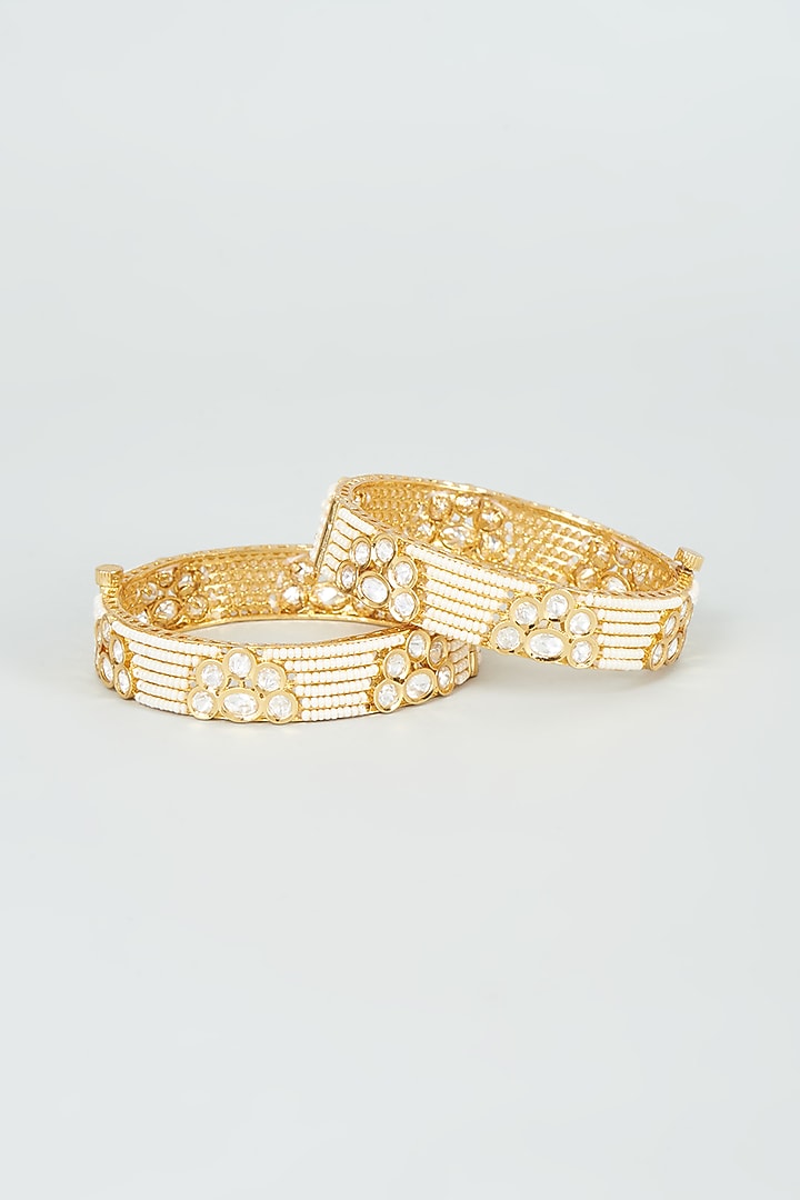 Gold Finish Kundan Polki & Pearl Bangles (Set Of 2) by VASTRAA Jewellery at Pernia's Pop Up Shop