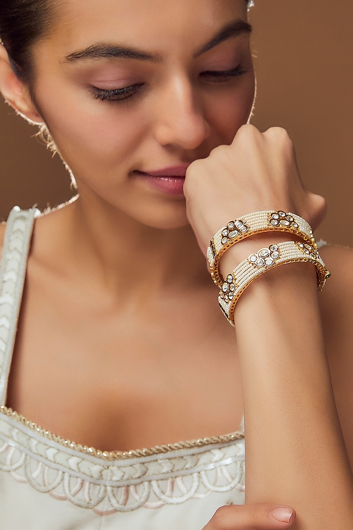 Gold Finish Kundan Polki & Pearl Bangles (Set Of 2) by VASTRAA Jewellery