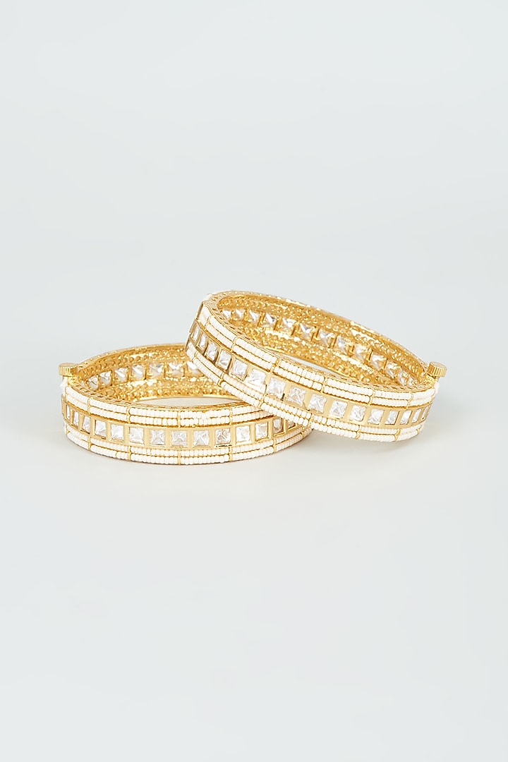 Gold Finish Kundan Polki & Pearl Temple Bangles (Set Of 2) by VASTRAA Jewellery at Pernia's Pop Up Shop