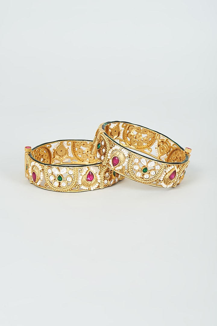 Gold Finish Kundan Polki & Multi-Colored Stone Bangles (Set Of 2) by VASTRAA Jewellery at Pernia's Pop Up Shop