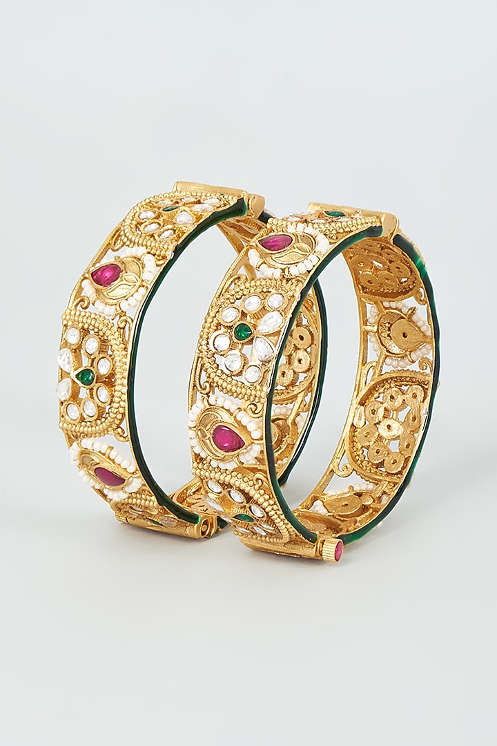 Gold Finish Kundan Polki & Multi-Colored Stone Bangles (Set Of 2) by VASTRAA Jewellery at Pernia's Pop Up Shop