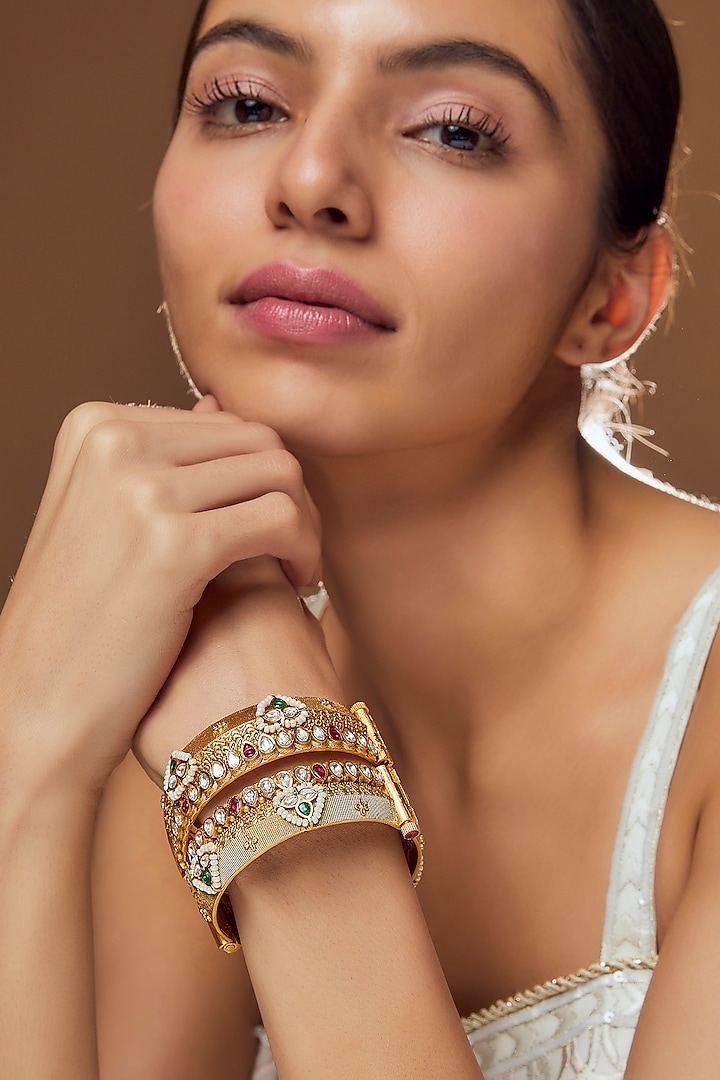 Gold Finish Kundan Polki & Pearl Bangles (Set of 2) by VASTRAA Jewellery at Pernia's Pop Up Shop