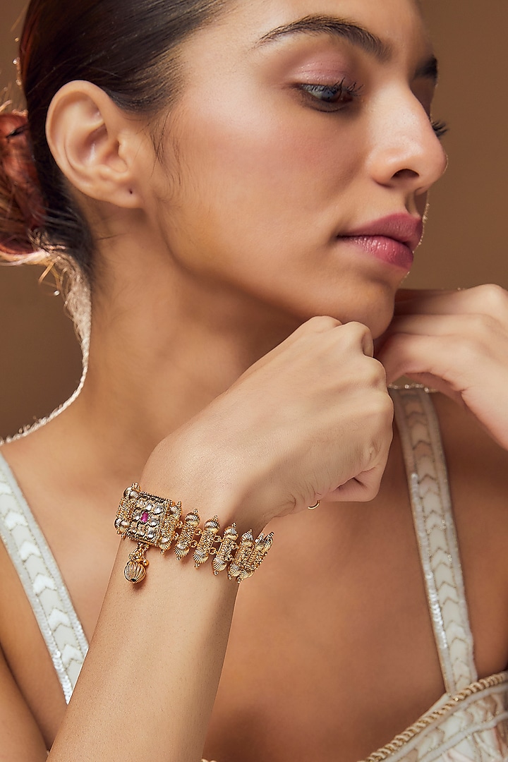 Gold Finish Kundan Polki & Ruby Bracelet by VASTRAA Jewellery