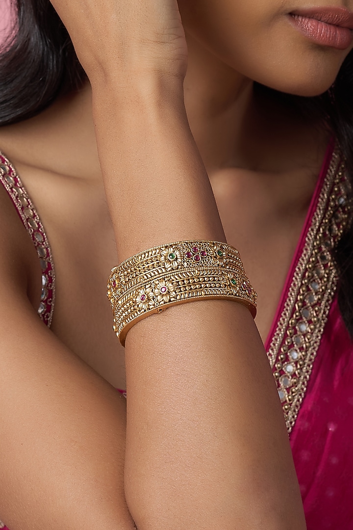 Gold Finish Kundan Polki & Multi-Colored Stone Temple Bangles (Set Of 2) by VASTRAA Jewellery at Pernia's Pop Up Shop