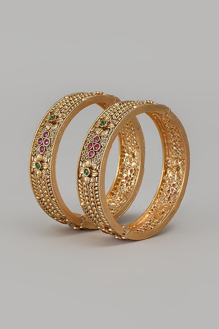 Gold Finish Kundan Polki & Multi-Colored Stone Temple Bangles (Set Of 2) by VASTRAA Jewellery at Pernia's Pop Up Shop