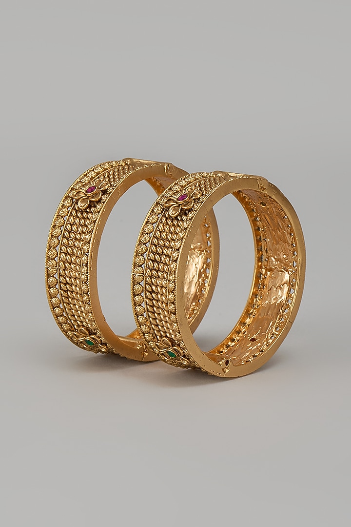 Gold Finish Kundan Polki & Multi-Colored Stone Temple Bangles (Set Of 2) by VASTRAA Jewellery at Pernia's Pop Up Shop