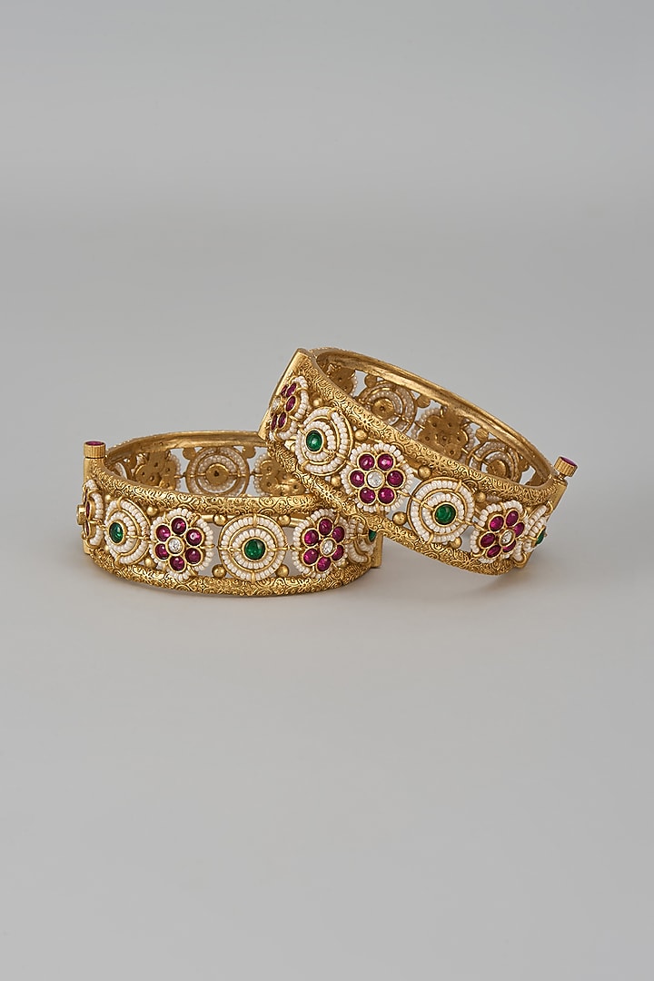 Gold Finish Kundan Polki & Multi-Colored Stone Temple Bangles (Set Of 2) by VASTRAA Jewellery at Pernia's Pop Up Shop