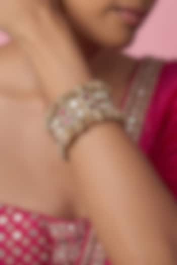 Gold Finish Kundan Polki & Red Stone Temple Bangles (Set Of 2) by VASTRAA Jewellery at Pernia's Pop Up Shop