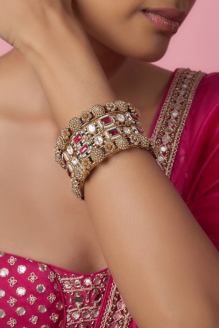 Gold Finish Kundan Polki & Red Stone Temple Bangles (Set Of 2) by VASTRAA Jewellery