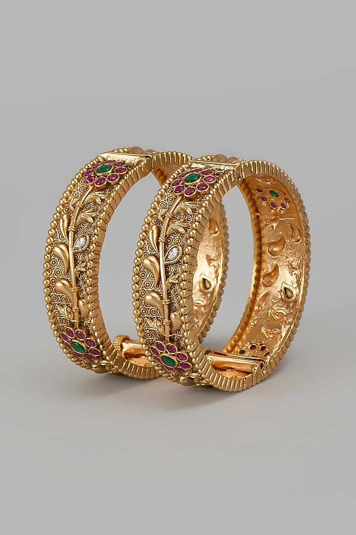 Gold Finish Kundan Polki & Multi-Colored Stone Temple Bangles (Set Of 2) by VASTRAA Jewellery at Pernia's Pop Up Shop