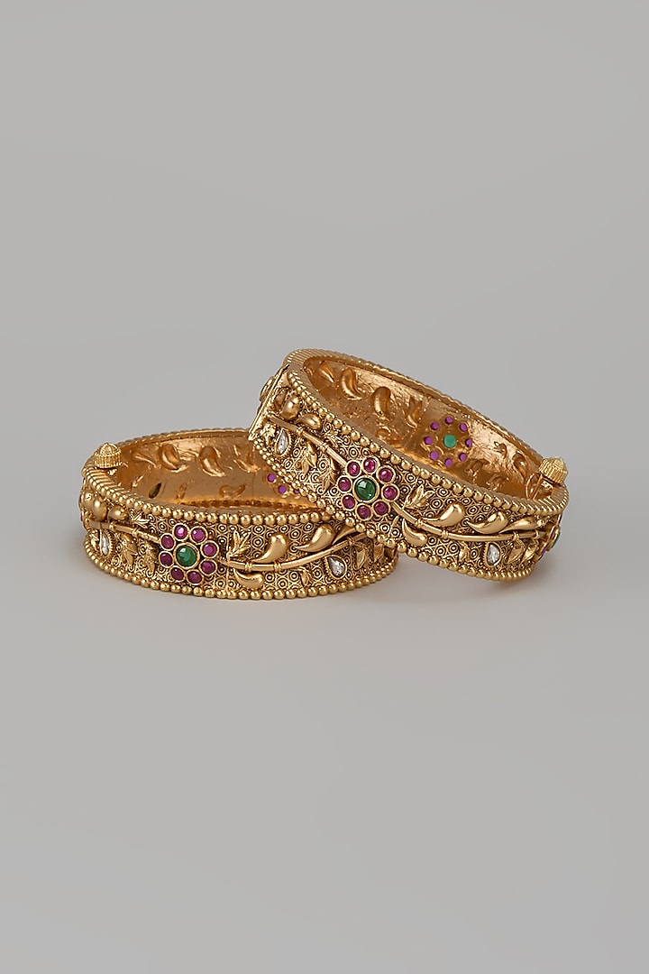 Gold Finish Kundan Polki & Multi-Colored Stone Temple Bangles (Set Of 2) by VASTRAA Jewellery at Pernia's Pop Up Shop