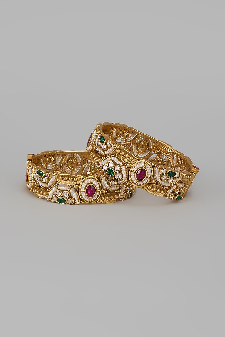 Gold Finish Kundan Polki & Multi-Colored Stone Temple Bangles (Set Of 2) by VASTRAA Jewellery at Pernia's Pop Up Shop