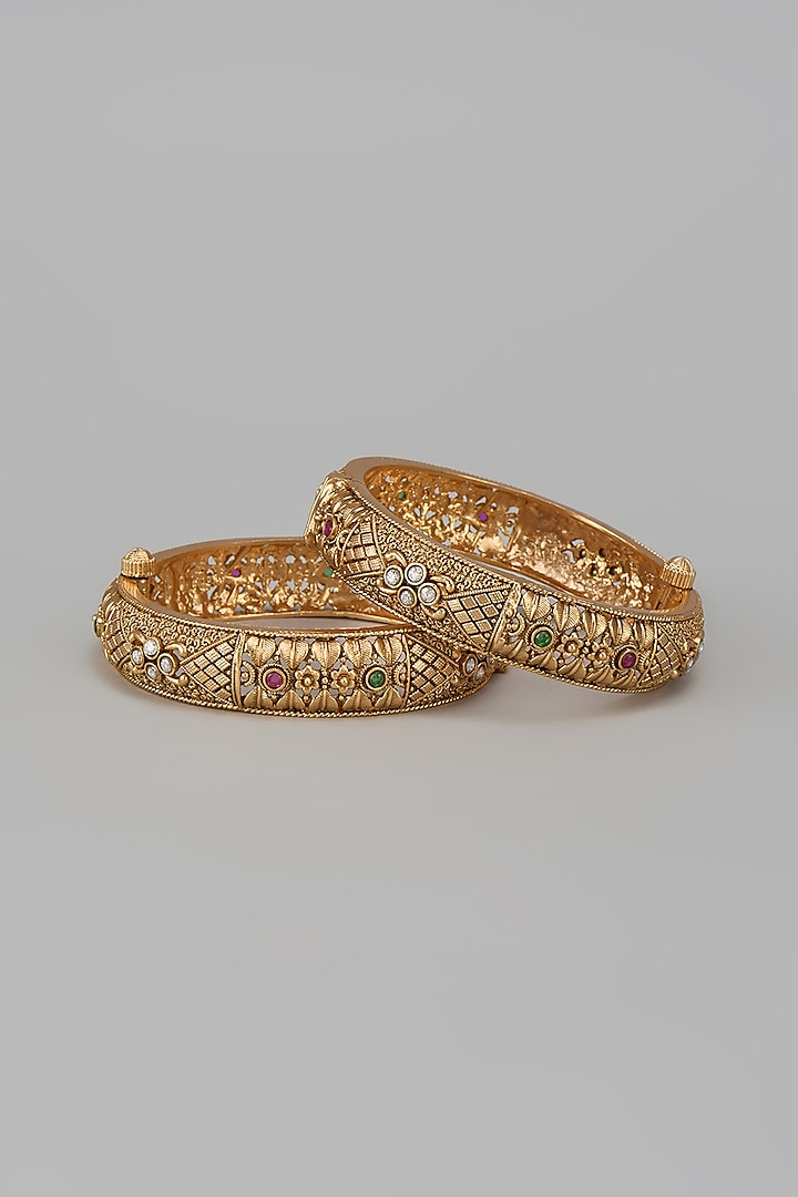 Gold Finish Kundan Polki & Multi-Colored Stone Temple Bangles (Set Of 2) by VASTRAA Jewellery at Pernia's Pop Up Shop