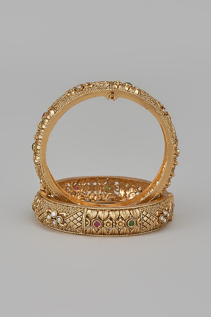 Gold Finish Kundan Polki & Multi-Colored Stone Temple Bangles (Set Of 2) by VASTRAA Jewellery at Pernia's Pop Up Shop