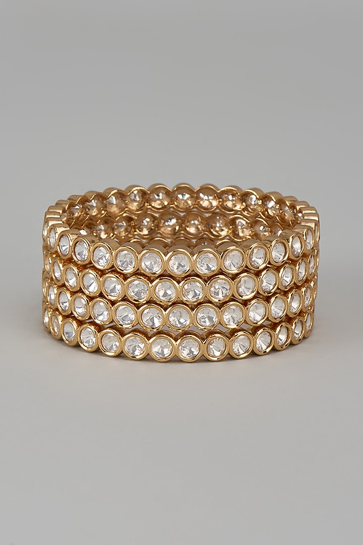 Gold Finish Kundan Polki Bangles (Set Of 4) by VASTRAA Jewellery at Pernia's Pop Up Shop