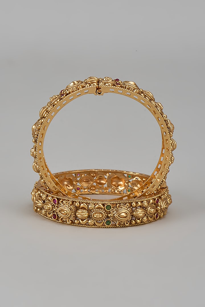 Gold Finish Emerald Stone Temple Bangles (Set of 2) by VASTRAA Jewellery at Pernia's Pop Up Shop