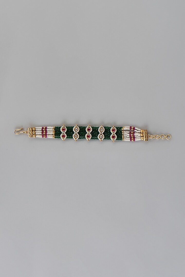 Gold Finish Kundan Polki & Red Stone Temple Bracelet by VASTRAA Jewellery at Pernia's Pop Up Shop