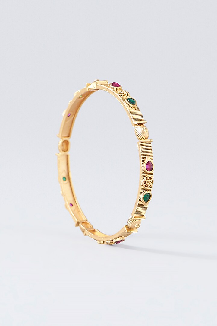 Gold Finish Kundan Polki & Multi-Colored Stone Temple Bangles (Set Of 4) by VASTRAA Jewellery at Pernia's Pop Up Shop