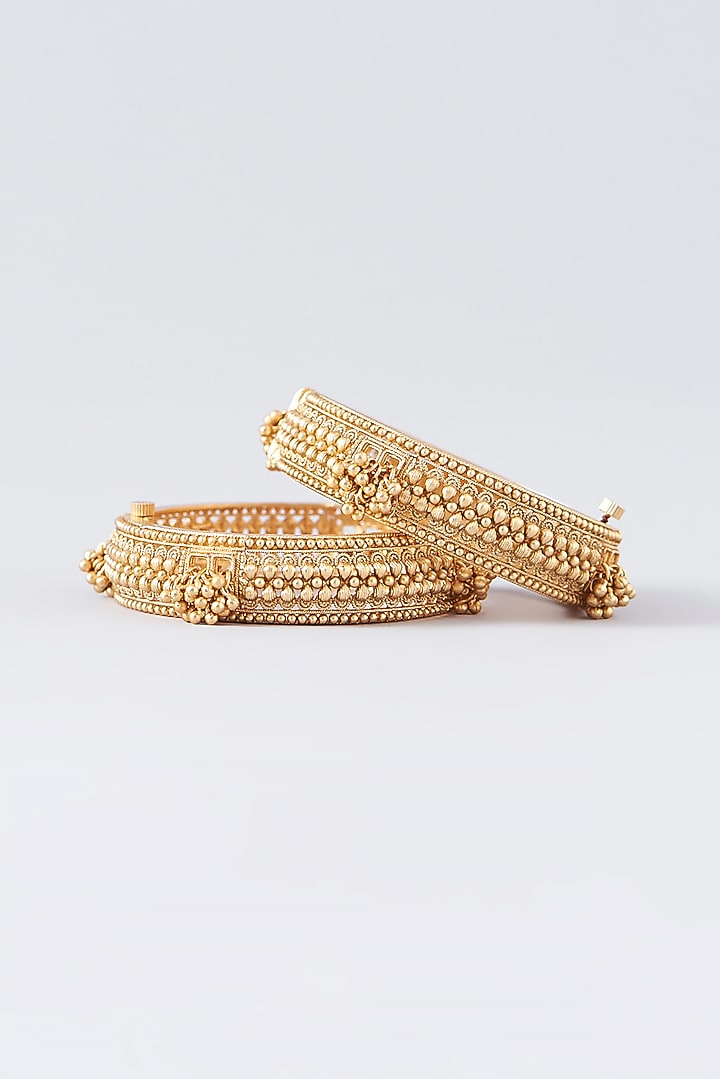 Gold Finish Kundan Polki Temple Bangles (Set Of 2) by VASTRAA Jewellery at Pernia's Pop Up Shop