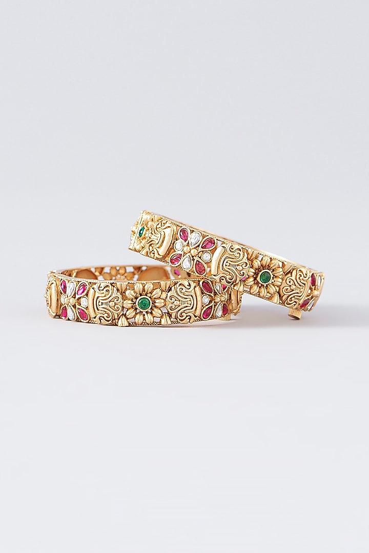 Gold Finish Kundan Polki & Multi-Colored Stone Temple Bangles (Set Of 2) by VASTRAA Jewellery at Pernia's Pop Up Shop