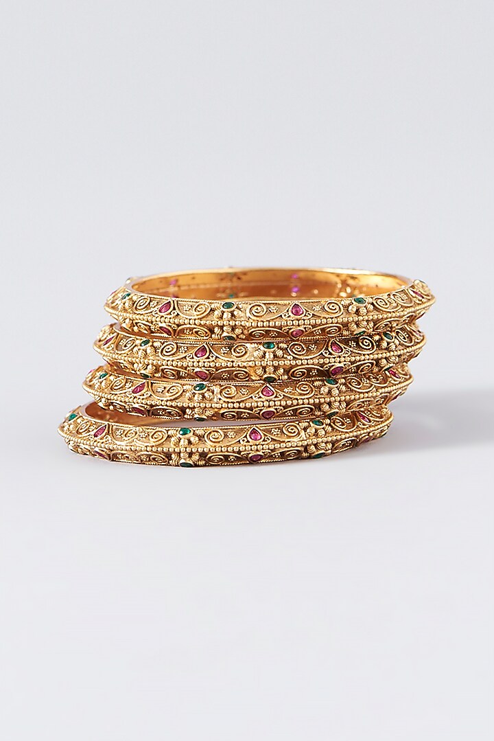 Gold Finish Kundan Polki Temple Bangles (Set Of 4) by VASTRAA Jewellery at Pernia's Pop Up Shop