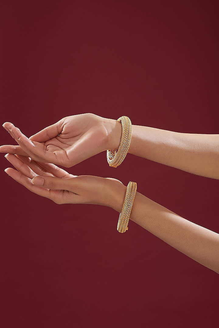 Gold Finish Kundan Polki Temple Bangles (Set Of 2) by VASTRAA Jewellery at Pernia's Pop Up Shop