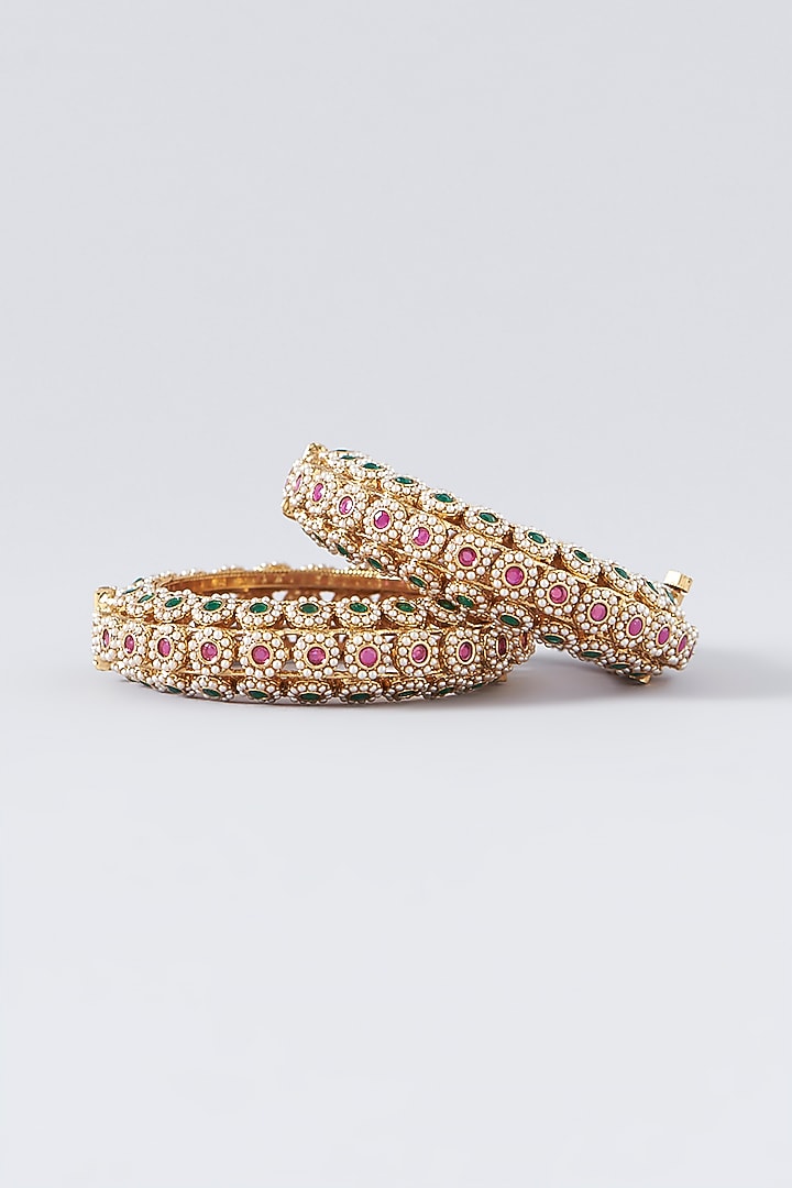 Gold Finish Pearl Temple Bangles (Set Of 2) by VASTRAA Jewellery at Pernia's Pop Up Shop