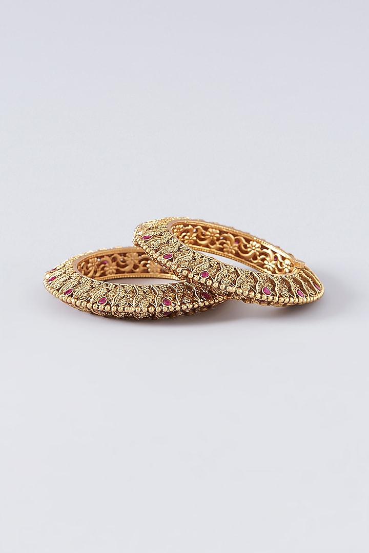 Gold Finish Kundan Polki Temple Bangles (Set Of 2) by VASTRAA Jewellery at Pernia's Pop Up Shop